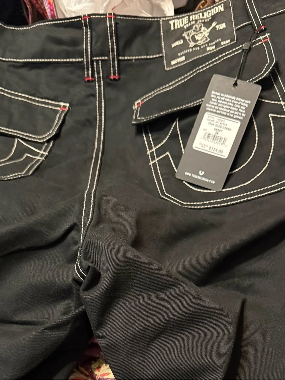 NWT True Religion Men’s Black Jean Shorts with White and Red Contrast.